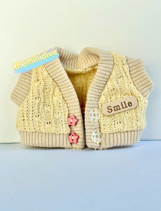 Labubu tops, beige sweater with decorative stars buttons and smile tag